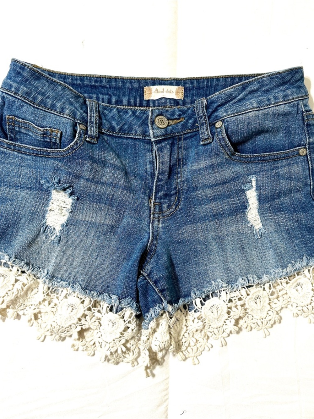 Altar'd State Blue Denim Distressed Jean Shorts with White Crochet Trim • 27